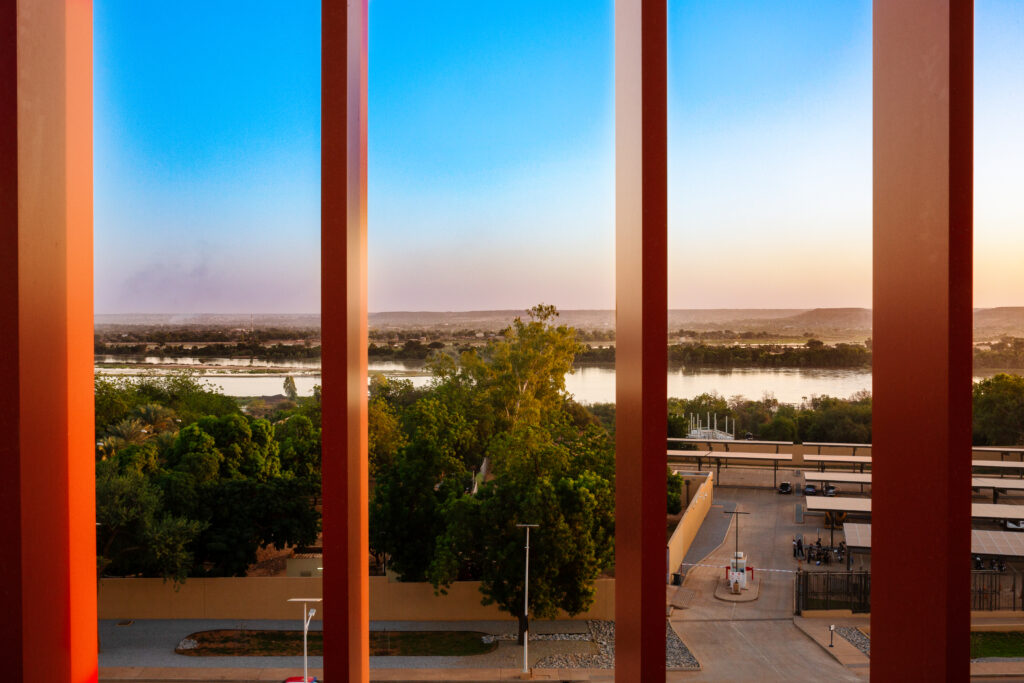 View of the Namibian landscape from the embassy's interior with the exterior brise soleil in the foreground.